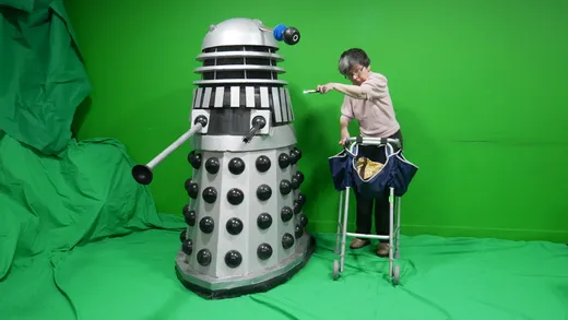 Members filming in the green-screen studio